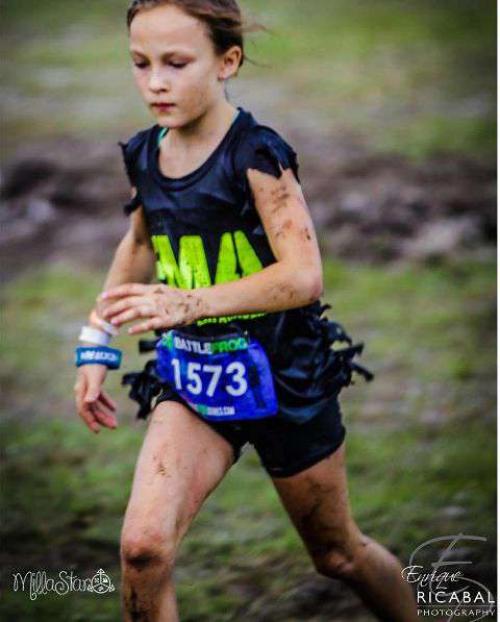 9-Летняя милла биззотто из Майами преодолела марафон, который включает в себя 58 км бега, 8 км плавания, все это с 25-тью препятствиями! 01