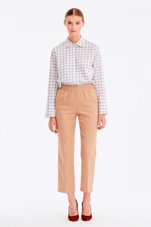 Легкие штаны на резинке. Есть из чего выбрать: фасоны брюк с резинками для любого повода